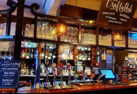 the bar inside the two chairmen dog friendly pub in london