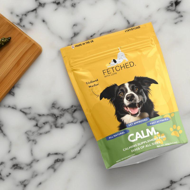 dog calming powder food topper on a granite background